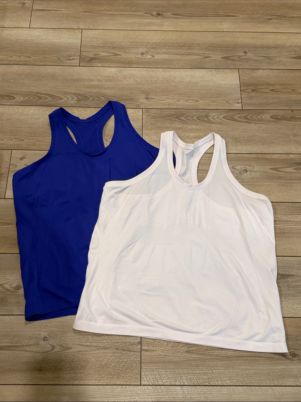 Set of Athleta Women’s Racerback Performance Tank tops  - pale pink & Royal Blue